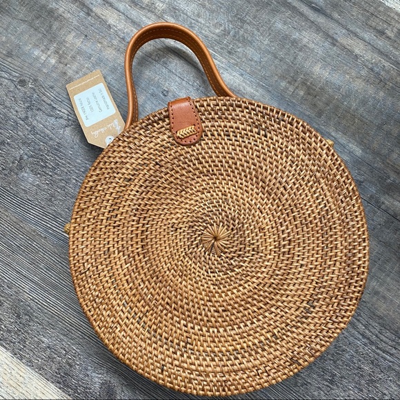 Pink Haley round wicker crossbody
